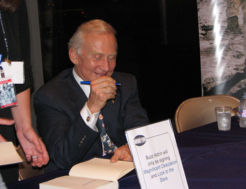 Buzz Aldrin signing books